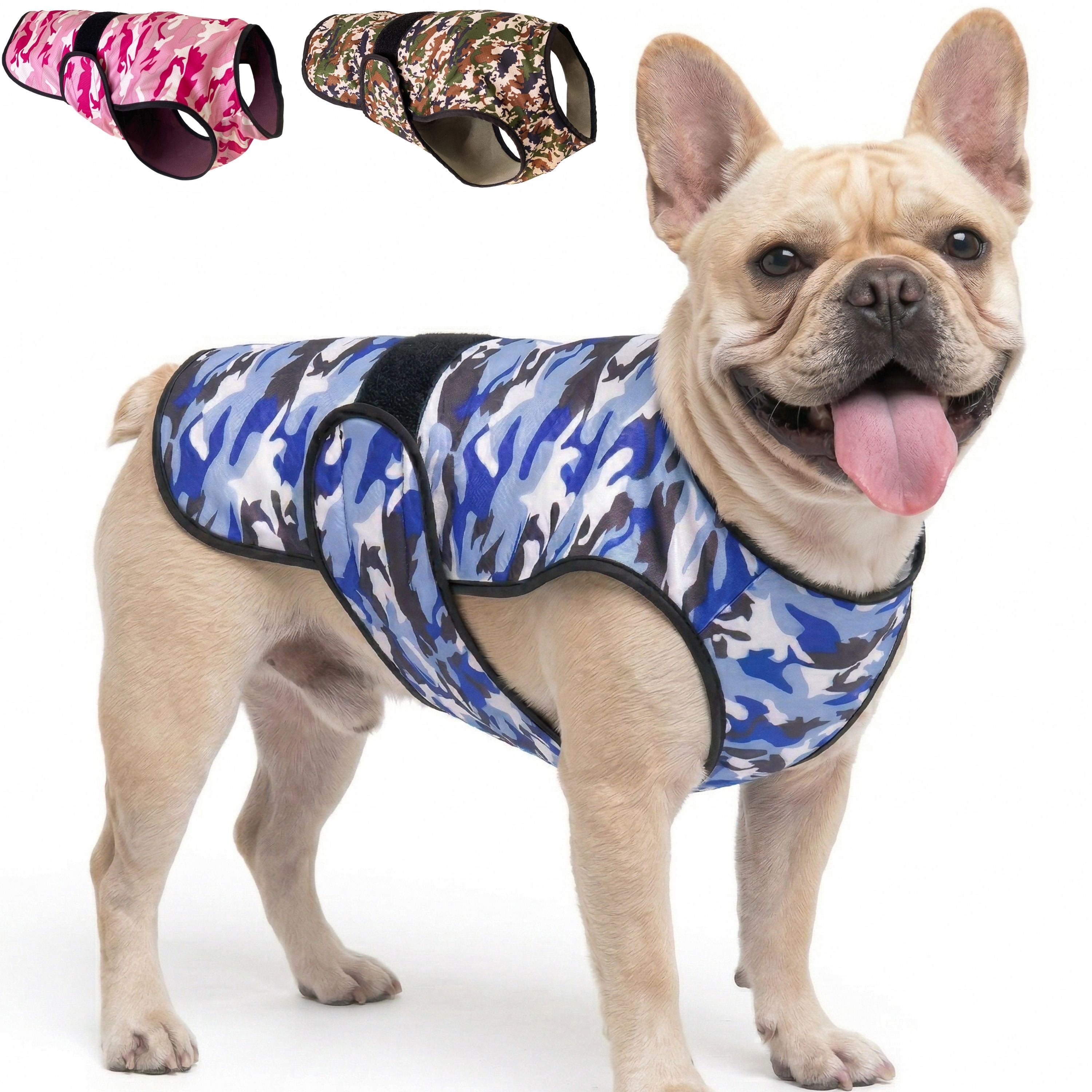 A dog standing against a white background wearing a camouflage cooling vest, with thumbnail options in the top corner other camouflage color variations.