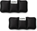 Two black ice pack inserts for dog cooling vests against a white background.