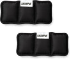 Two black ice pack inserts for dog cooling vests against a white background.
